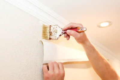 Pose de papier peint à Canens — revêtements muraux et toiles de verre
